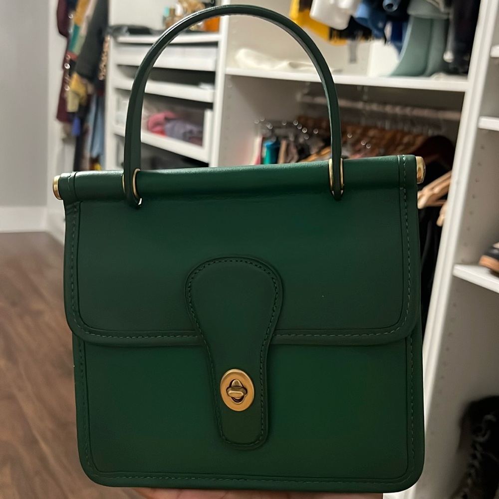 Never worn hunter green genuine leather coach purse with strap